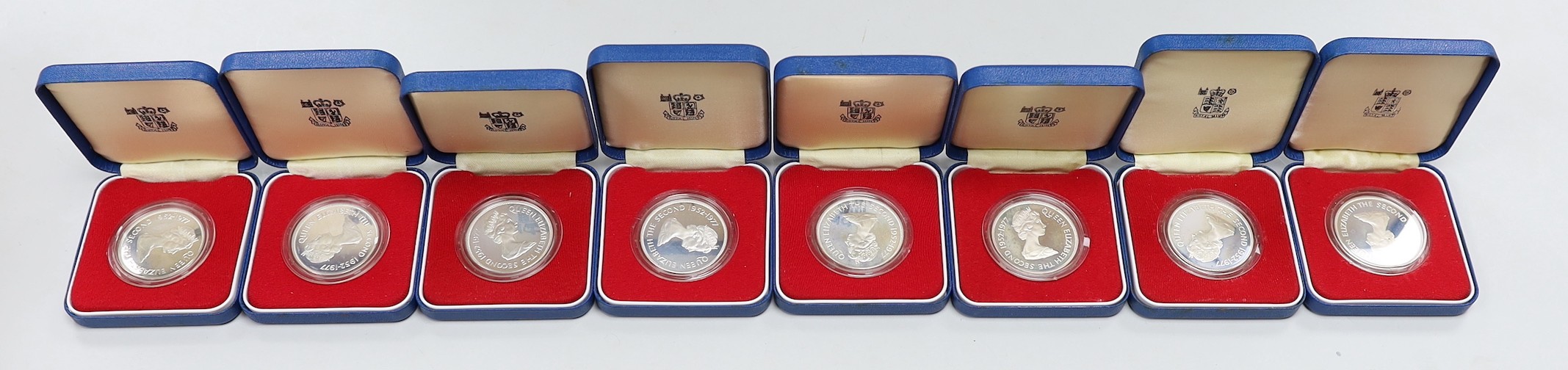 Eight Royal Mint QEII Commonwealth proof silver commemorative coins